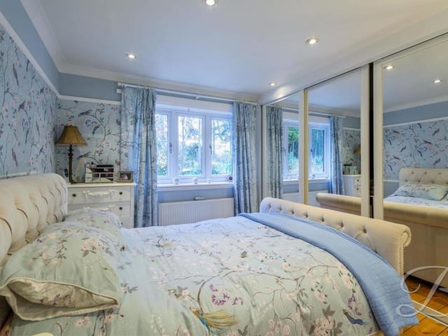 The second bedroom is also a good size, but it benefits most from mirrored, sliding wardrobes. There is a central-heating radiator and a window to the back of the property too.