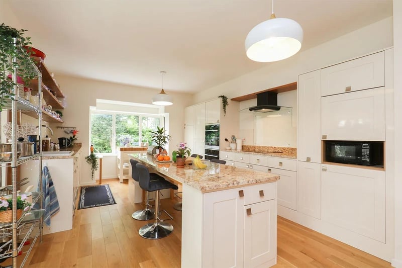 A fabulous open plan living kitchen adjoins the impressive lounge area.