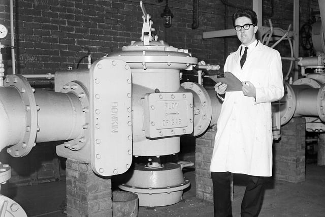 Hugh Campbell inspecting machinery at the reforming plant at Granton Gas Station in 1963.