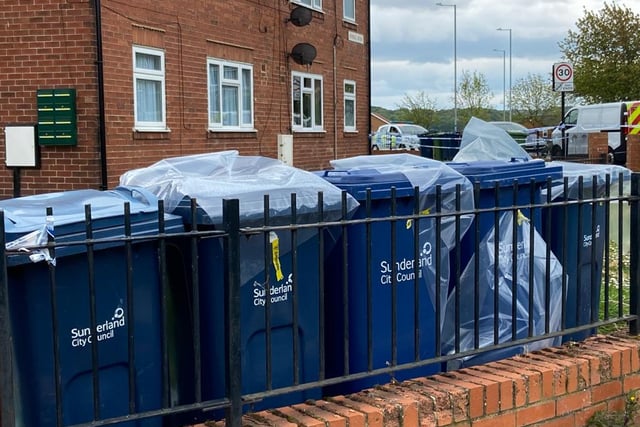 It is not yet clear why officers have sealed off the bins