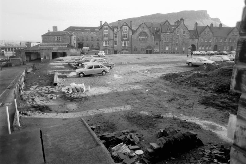 Cars parked in the gap-site at the junction of Drummond Street and The Pleasance Edinburgh in december 1984.