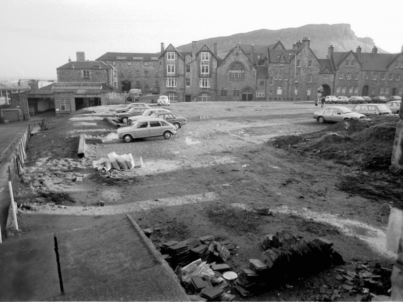 Cars parked in the gap-site at the junction of Drummond Street and The Pleasance Edinburgh in december 1984.