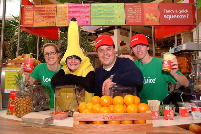 Lovejuice opened in Meadowhall Oasis Food Hall in 2006.  John Heseltine, founder of Lovejuice, cutting a ribbon to officially open his latest store with his two Sheffield staff, Melanie Dydhe manager and Daniel Differ, trainee supervisor.