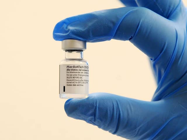 The Pfizer vaccine pictured couldn't be transported to people's homes due to the temperature it had to be kept at (Picture: Michael Gillen).