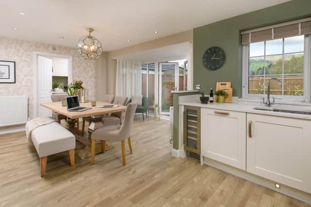 B&DWYW - 004 - A kitchen dining area in a David Wilson Homes show home