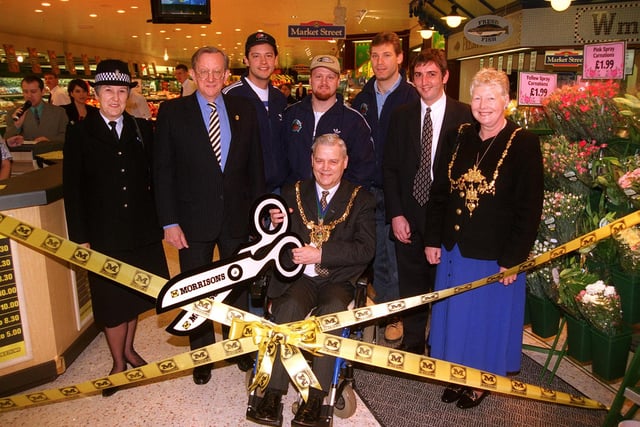 The official opening ceremony of Morrisons store at Halfway, Sheffield in 1998, pictured PC Jean Payling community liaison officer for Sheffield South,  Chairman of Morrisons Mr Ken Morrison, Sheff Steelers players, Ron Shudera, Jamie Van Der Horst, and Frank Kovacs, the store manager  Mark Parkin, and the Lady Mayoress Mrs Rosemary Arber, Centre is the Lord Mayor of Sheffield Coun Tony Arber.
