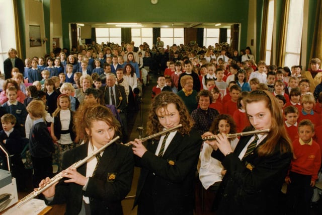 Girls from St Wilfrid's play their flutes at the School's Praise 93 festival.  Left to right are Nicola Biancui, Lisa Fraser and Miriam Ritson. But which year is this?