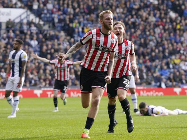 Sheffield United's Oliver McBurnie celebrates his goal against West Bromwich Albion: Andrew Yates / Sportimage