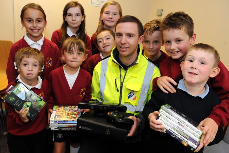 Youngsters from Primrose Community Centre Funhouse Youth Club received an Xbox from Tyne Tunnel 2 supervisor Michael Ayre in 2003. Remember this?