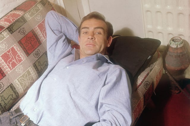 Sean Connery, best known for his role in seven of the James Bond films, relaxing in his ground floor basement flat in London's NW5. 