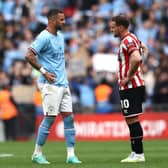 Billy Sharp of Sheffield United talks with Kyle Walker of Manchester City, who also supports the South Yorkshire club: Darren Staples / Sportimage