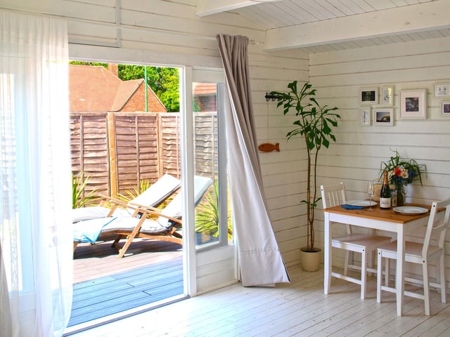 Inside Sea Mist's cabin, with a view to its secluded sun deck.