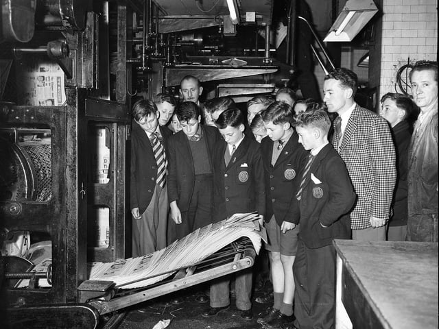 Golspie Technical School pupils visiting The Scotsman office in October 1960 watch television guides being printed.