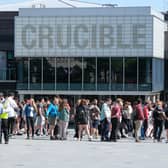 Students queue at The Crucible Theatre in Sheffield to get their Covid vaccinations
