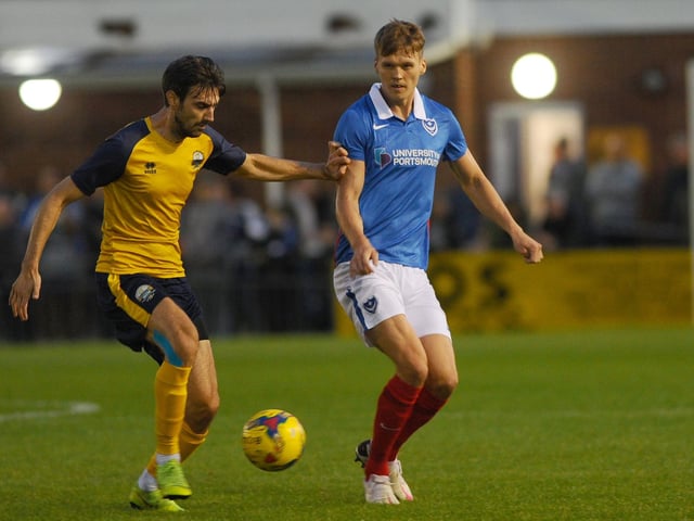 Sean Raggett puts pressure on his Gosport Borough opponent.  Picture: Sarah Standing (010920-6564)