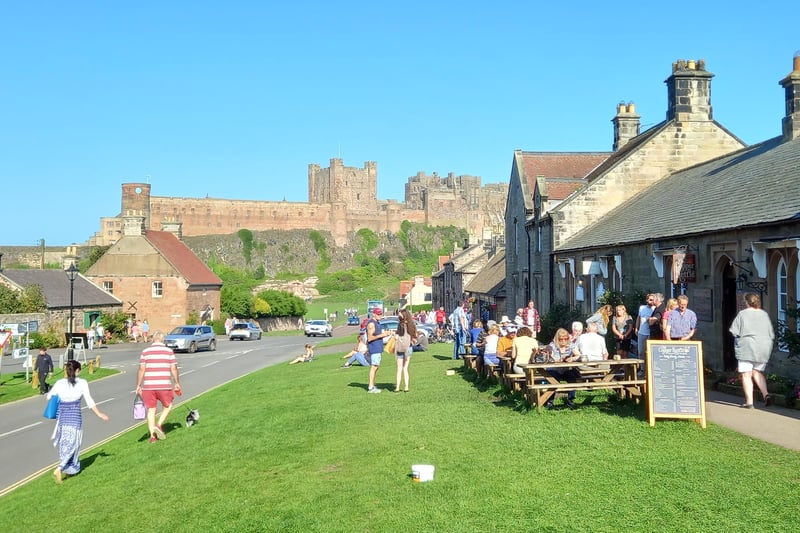 Busy scenes by the Copper Kettle Tea Rooms in Bamburgh.