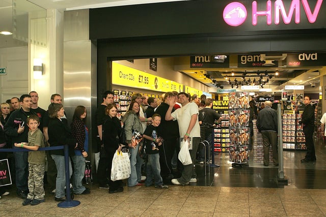 Hmv was on the High Street in Meadowhall for 33 years. This picture shows fans waiting to meet WWE stars, Jeff Hardy and Candice at the old shop.