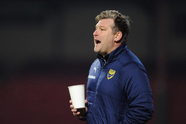 Oxford manager Karl Robinson has issued a warning to players who remain unvaccinated against COVID-19. It comes after Robinson was without a number of players during Saturday’s win over promotion rivals Sheffield Wednesday. Midfielders Gavin Whyte and Marcus McGuane both tested positive for the virus which also forced teammate Mark Sykes to miss out as a precaution. Whyte has since been removed from the Northern Ireland squad for the upcoming World Cup qualifiers and Robinson says his players have to accept the decisions being made. He told BanburyCake: ““From a manager’s point of view, it makes our job easier if you have the jab. Maybe the reality of this scenario might change one of two things.” He added: “I’d like my players to have the jab, that’s something they know. If you don’t have it, the world’s slightly different for you in the short term, maybe even the medium and long term. You’ve got to accept the regulations.” (Photo by Alex Burstow/Getty Images)