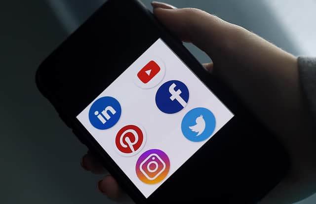This illustration picture shows social media applications logos from Linkedin, YouTube, Pinterest, Facebook, Instagram and Twitter. (Photo by OLIVIER DOULIERY/AFP via Getty Images)