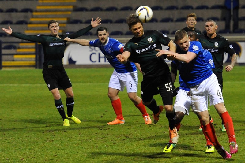 Raith's Craig Barr beating Tommy O'Brien to the ball in April 2015