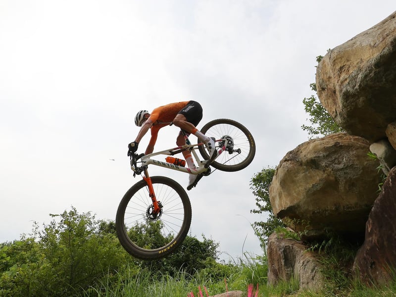 Mathieu van der Poel of Team Netherlands suffers a fall during the Men's Cross-country race on day three of the Tokyo 2020 Olympic Games at Izu Mountain Bike Course