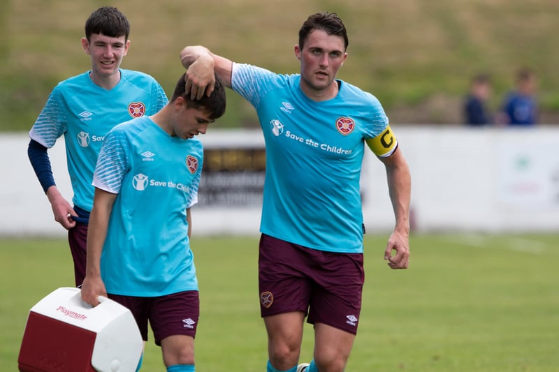 Hearts' John Souttar (right) wore the armband during the second half, claiming it from first half captain Michael Smith.