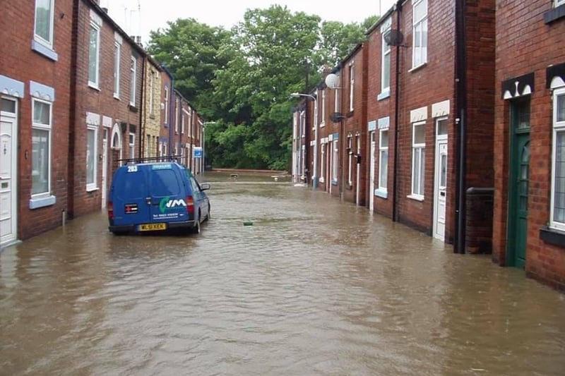 The floodwater was higher than the wall at the bottom of Alma Street West.