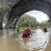 Volunteers from Yorkshire Lowland Search and Rescue take to their boats in the deep, muddy floodwater in Catcliffe (Photo: Yorkshire Lowland Search and Rescue)