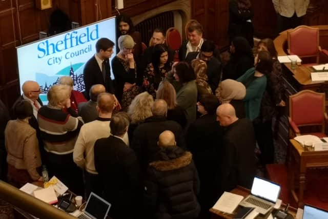 Sheffield Labour councillors huddled to hear the result of legal advice over a 7,500-name petition to the city council in support of the people of Gaza. Picture: Peter Gilbert