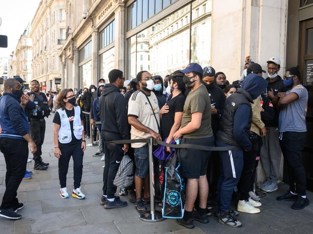 Tightly-packed crowds gathered outside the Nike Town store at London’s Oxford Street for its reopening.