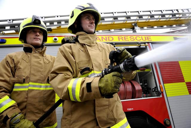 Fire Service.Generic Fire engine and Fire service officers .Picture Richard Ponter 132217b