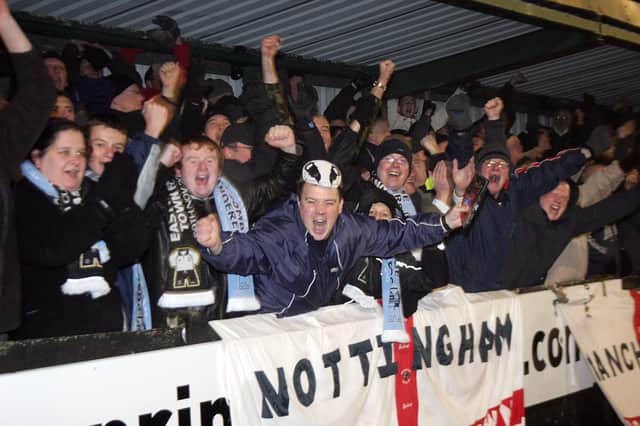 Eastwood's fans celebrate the win over Wycombe Wanderers in round two.