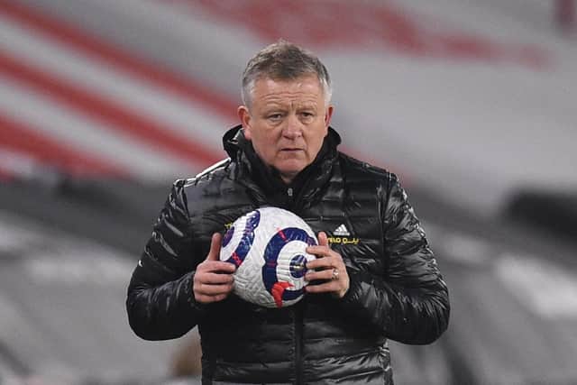 Sheffield United manager Chris Wilder returns the ball to play during the Premier League match at Bramall Lane, Sheffield: Oli Scarff/PA Wire