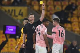 Sheffield United's Rhian Brewster is shown a yellow card at Wolves. (Catherine Ivill/Pool via AP)