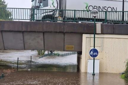 A path flooded under the Meadowhall road bridge. PIcture: David Walsh, National World
