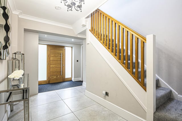 This is a visually 'stunning' property. This entrance hall connects the study and seperate lounge with the open plan kitchen/dining/living room.
