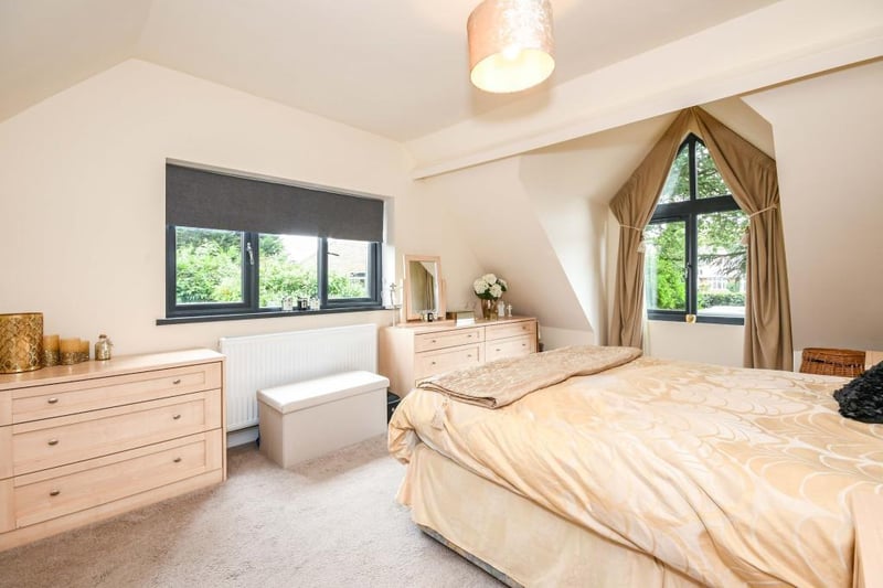 Bedroom four is a first-floor, double bedroom with two double-glazed windows, built-in wardrobes and a double radiator.