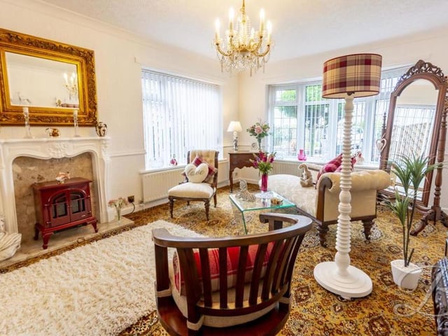 This second shot of the living room shows the feature fireplace. Imagine warm and cosy winter nights relaxing in here.