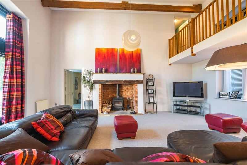 The property boasts a modern, but cosy living room, which is large in size and lets in plenty of light