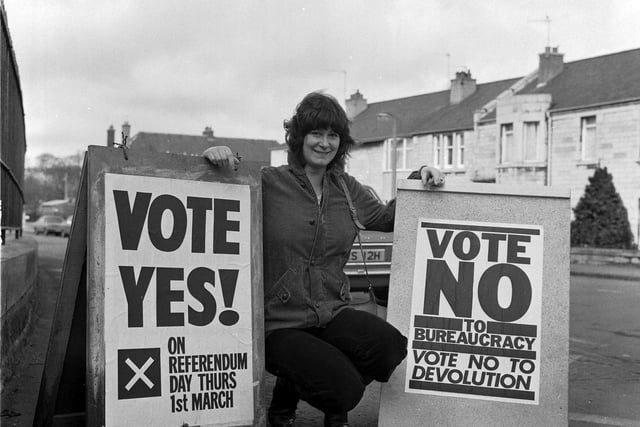 Nurse Margaret McEwan outside Roseburn polling station in Edinburgh before voting in the Scottish devolution referendum in March 1979. Ms McEwan with Yes board and No board.