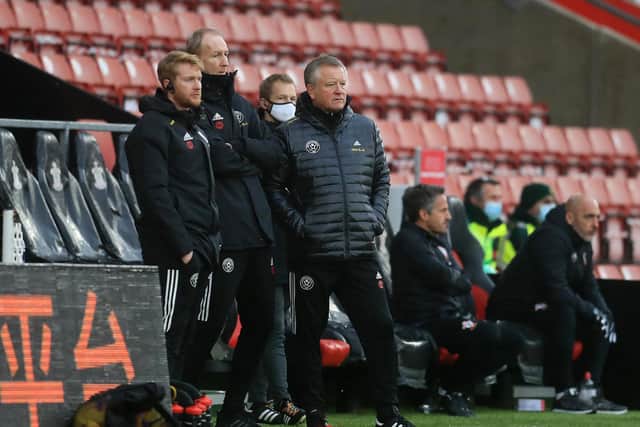 Chris Wilder, Manager of Sheffield United looks on during the Premier League match between Southampton and Sheffield United at St Mary's Stadium on December 13, 2020 in Southampton, England. A limited number of spectators (2000) are welcomed back to stadiums to watch elite football across England. This was following easing of restrictions on spectators in tiers one and two areas only. (Photo by Adam Davy - Pool/Getty Images)