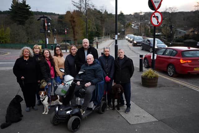 Oughtibridge Road Safety Action Group Chairman Gary Chamberlain, Amanda Rawson, Committee member, Wendy Godber,Social Media Liason Officer, Jennifer Murphy, Landlady at The Cock Inn, pictured with concerned residents at the  Bridge Hill junction.