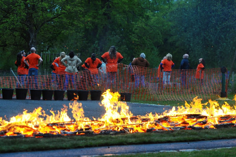 Getting the firewalk ready for the volunteers (Pic: Michael Gillen)