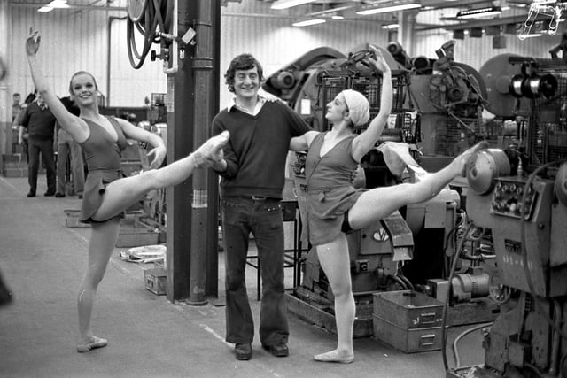 Factory floor workers at Plessey Telecommunications spent their lunchtime having a ballet lesson from the Northern Dance Theatre Company in 1975.  Ballet stars Wendy Roe (left) and Norma Atallah display some of their skills to  machine operator Len  Hunter.