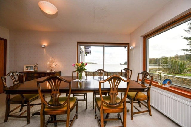 The dining room has sea views from two windows.