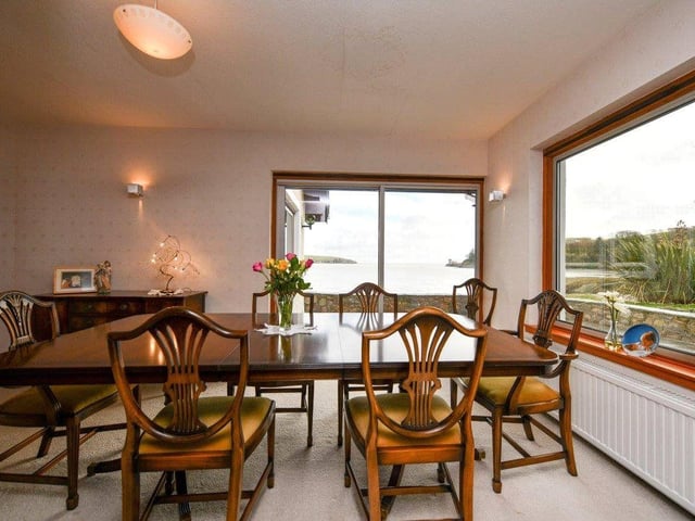 The dining room has sea views from two windows.