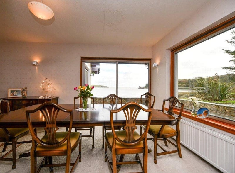 The dining room has sea views from two windows.