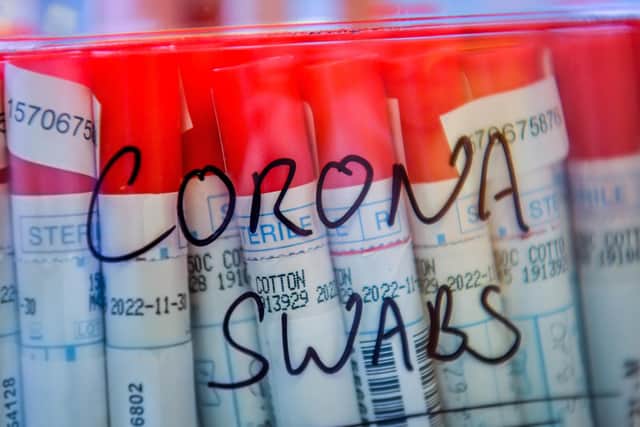 Coronavirus COVID-19 swabs from patients are kept in a plastic sealed tub as lab technicians carry out a diagnostic test for coronavirus in the microbiology laboratory inside the Specialist Virology Centre at the University Hospital of Wales in Cardiff: Ben Birchall/PA Wire