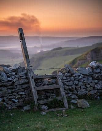 The photographer is raising money to replace the broken stile in Winnats Pass.