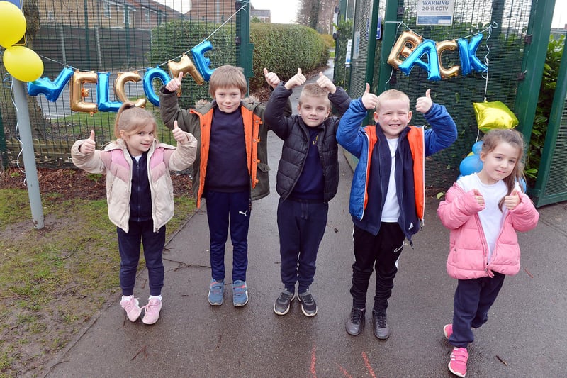 Pupils at Hollingwood Primary show their joy at being back at school